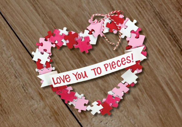 Heart-shaped wreath made of puzzle pieces